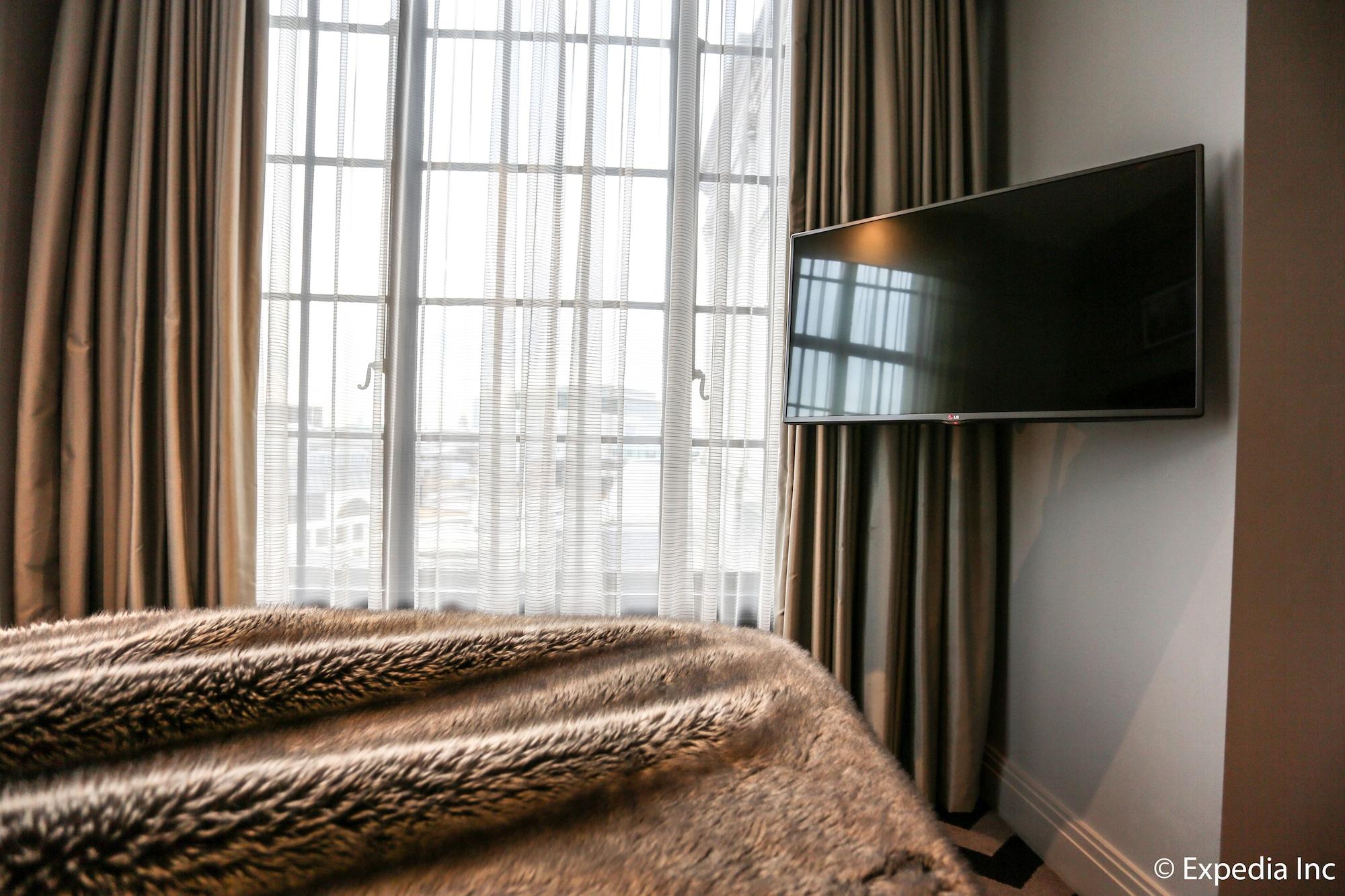 Hotel Gotham Manchester Exterior photo A television mounted on a wall